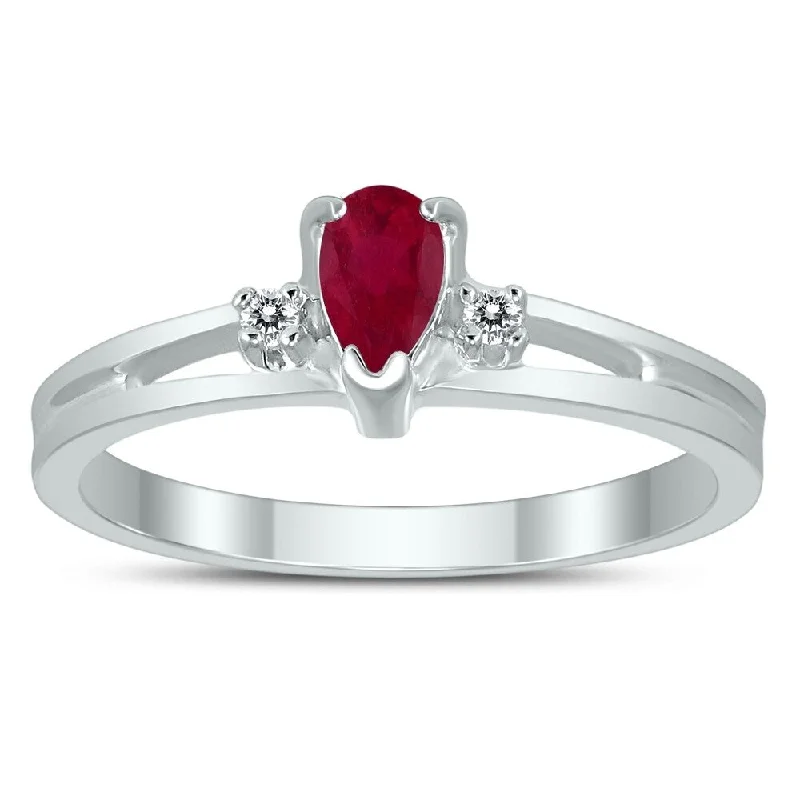 5X3MM Ruby and Diamond Pear Shaped Open Three Stone Ring in 10K White Gold