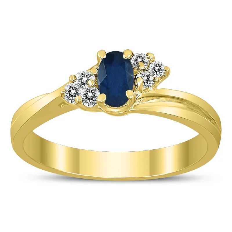 5X3MM Sapphire and Diamond Twist Ring in 10K Yellow Gold