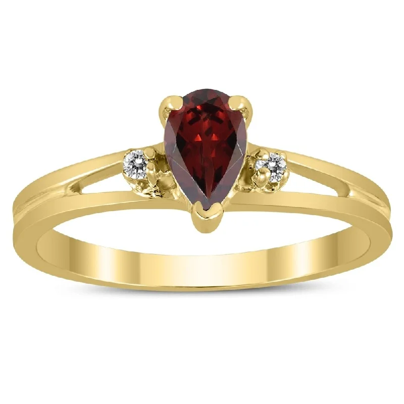 6X4MM Garnet and Diamond Pear Shaped Open Three Stone Ring in 10K Yellow Gold