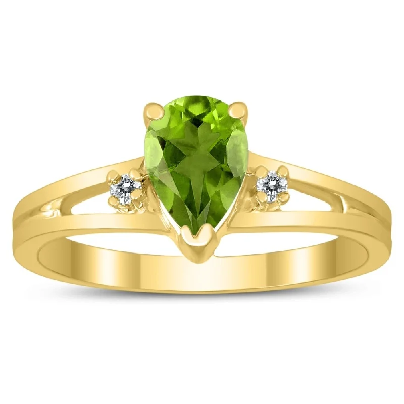 7X5MM Peridot and Diamond Pear Shaped Open Three Stone Ring in 10K Yellow Gold