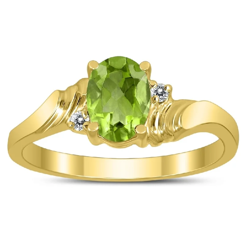 7X5MM Peridot and Diamond Wave Ring in 10K Yellow Gold