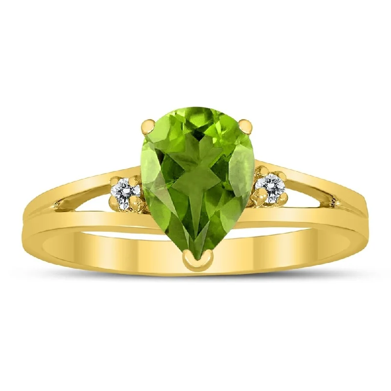 8X6MM Peridot and Diamond Pear Shaped Open Three Stone Ring in 10K Yellow Gold