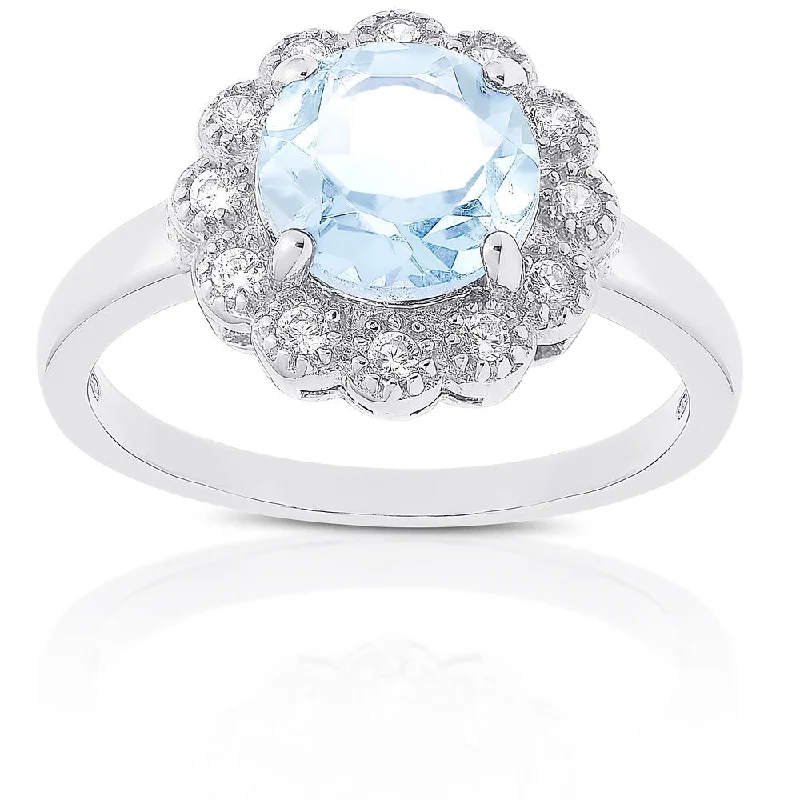 Dolce Giavonna Sterling Silver Blue and White Topaz Flower Ring