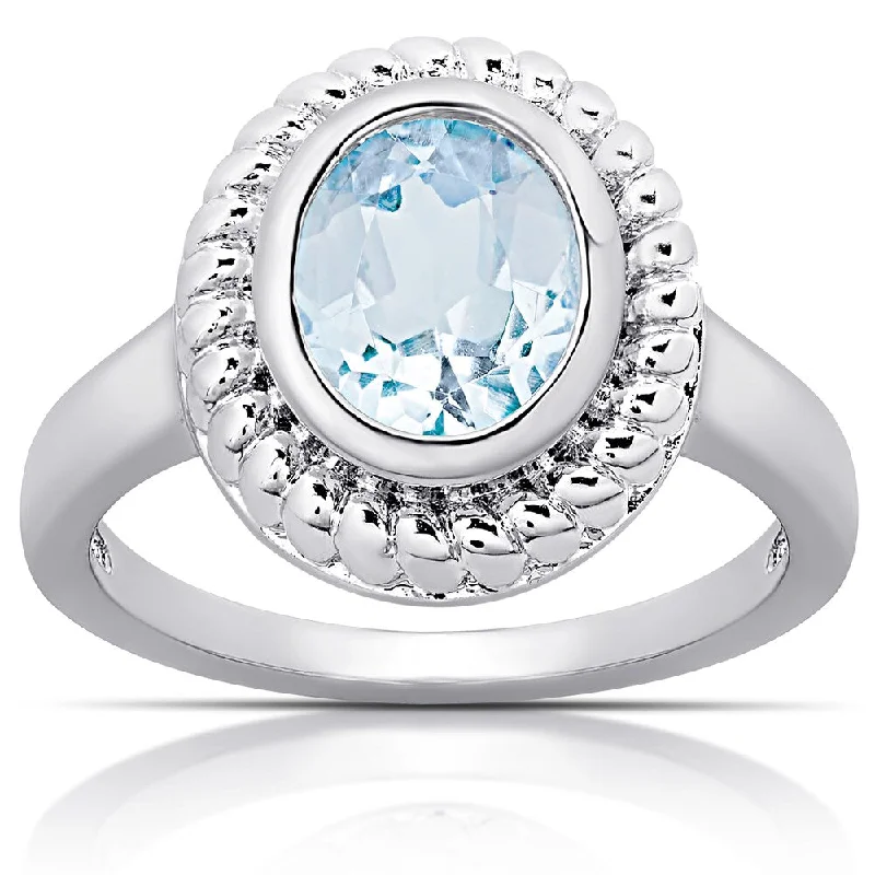 Dolce Giavonna Sterling Silver Blue Topaz Oval Cocktail Ring (Size 7)