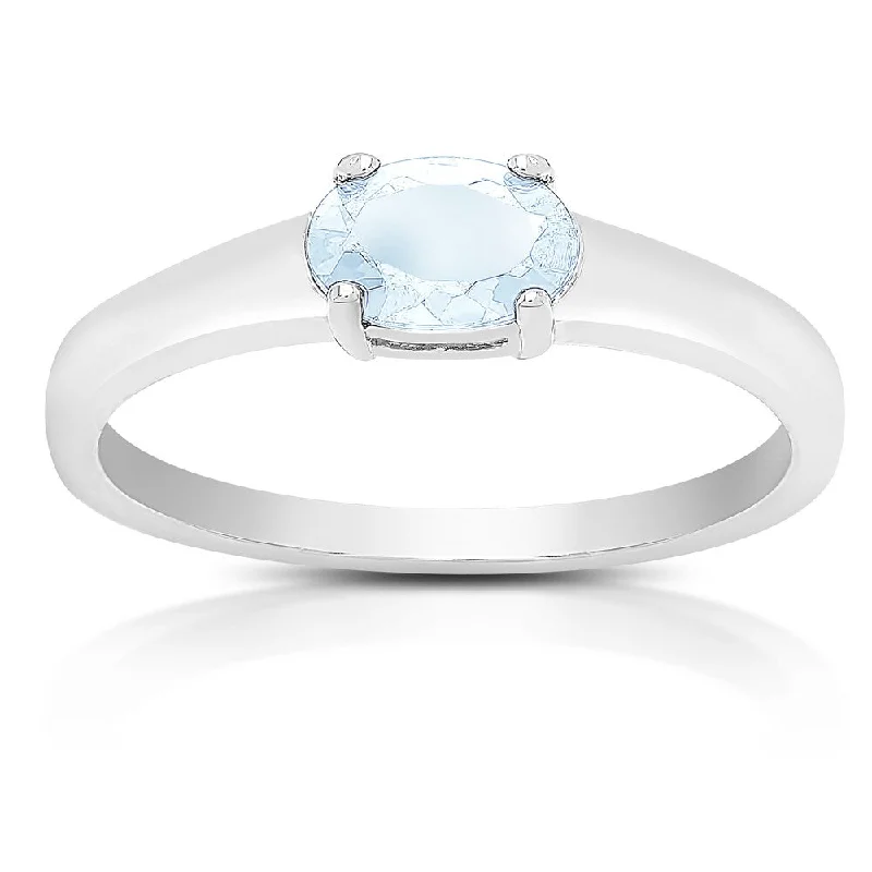 Dolce Giavonna Sterling Silver Blue Topaz Oval Solitaire Ring