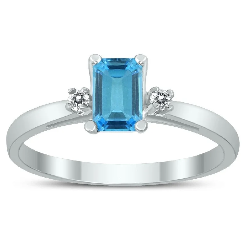 Emerald Cut 6X4MM Blue Topaz and Diamond Three Stone Ring in 10K White Gold