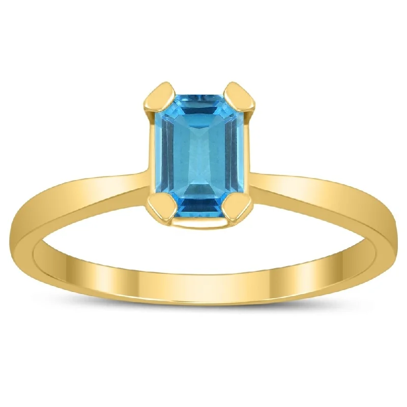 Emerald Shaped 6X4MM Blue Topaz Solitaire Ring in 10K Yellow Gold