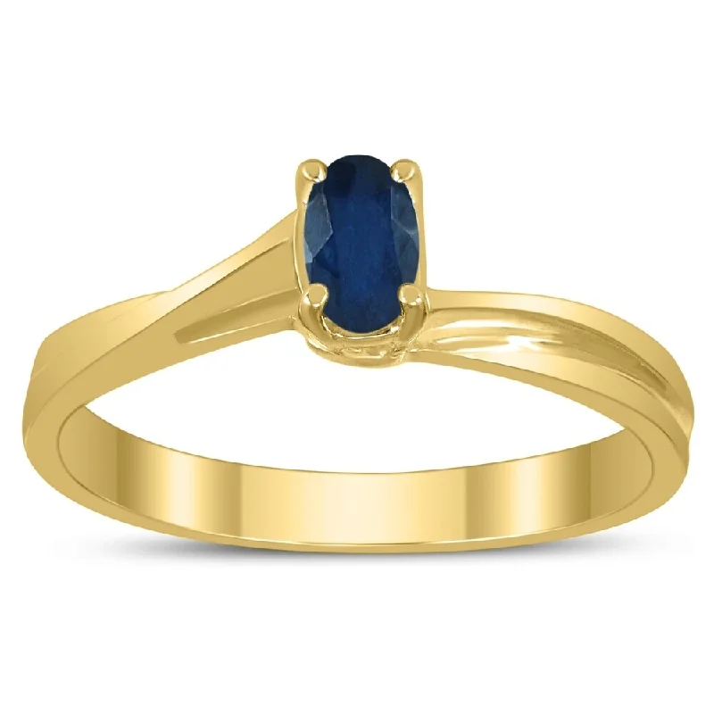 Solitaire Oval 5X3MM Sapphire Gemstone Twist Ring in 10K Yellow Gold