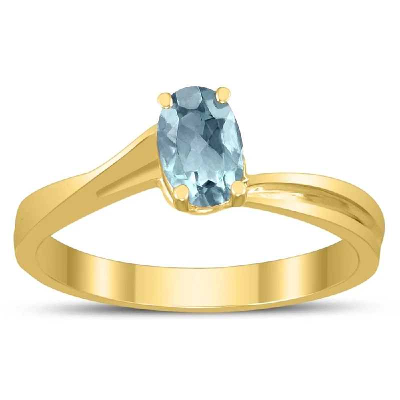 Solitaire Oval 6X4MM Aquamarine Gemstone Twist Ring in 10K Yellow Gold