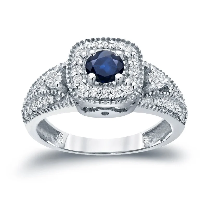 Three Stone 1/5ct Blue Sapphire and 2/5ct TDW Diamond Halo Engagement Ring in 14k Gold by Auriya