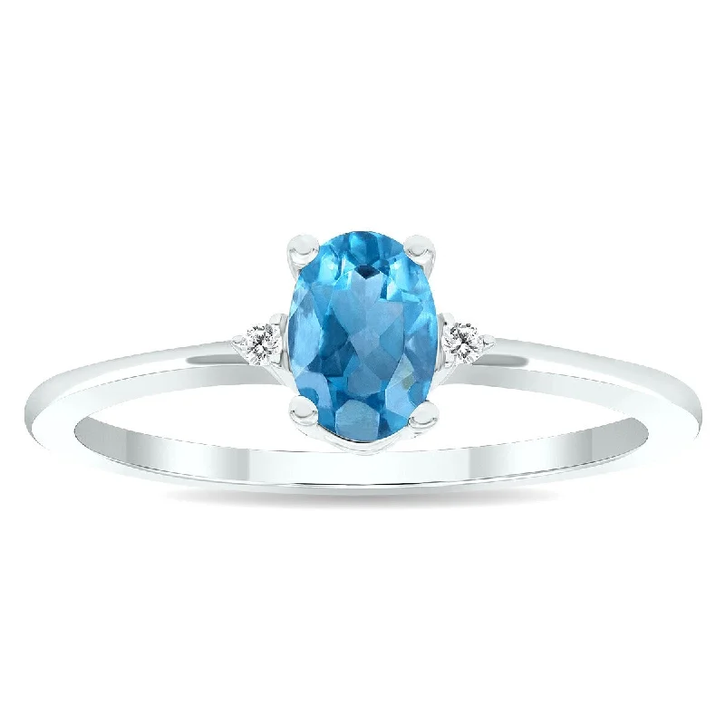 Women's Blue Topaz and Diamond Classic Band in 10K White Gold