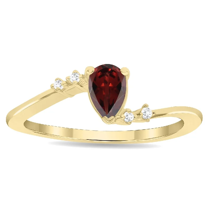 Women's Pear Shaped Garnet and Diamond Wave Ring in 10K Yellow Gold