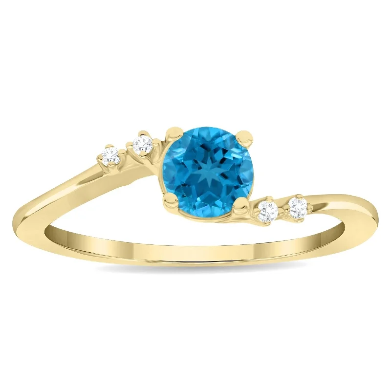 Women's Round Shaped Blue Topaz and Diamond Tierra Ring in 10K Yellow Gold