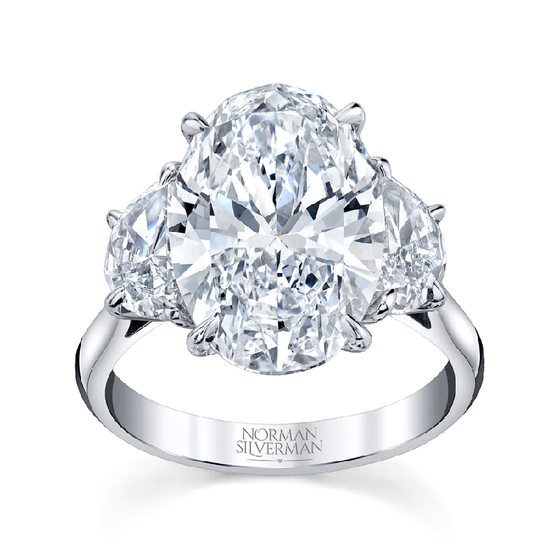 6.05 Carat Platinum Oval-Cut with 2 Half-Moon Shaped Diamond Ring