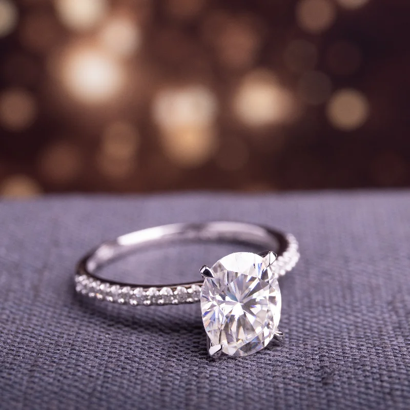 Miadora 2ct DEW Oval-cut Moissanite and 1/10ct TDW Diamond Engagement Ring in 14k White Gold